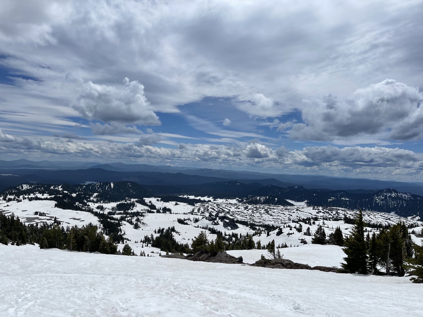 Sliding down the snow slope with the range spread out ahead