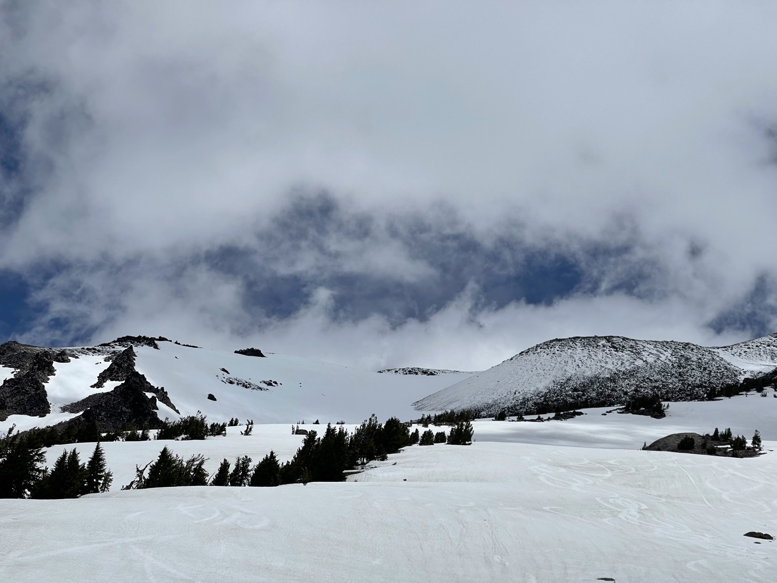 The top of the mountain appearing beyond the glacier