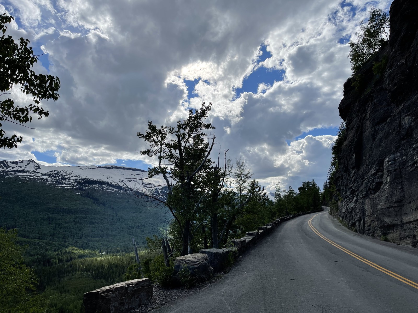 The road starting to tilt upward toward higher ground