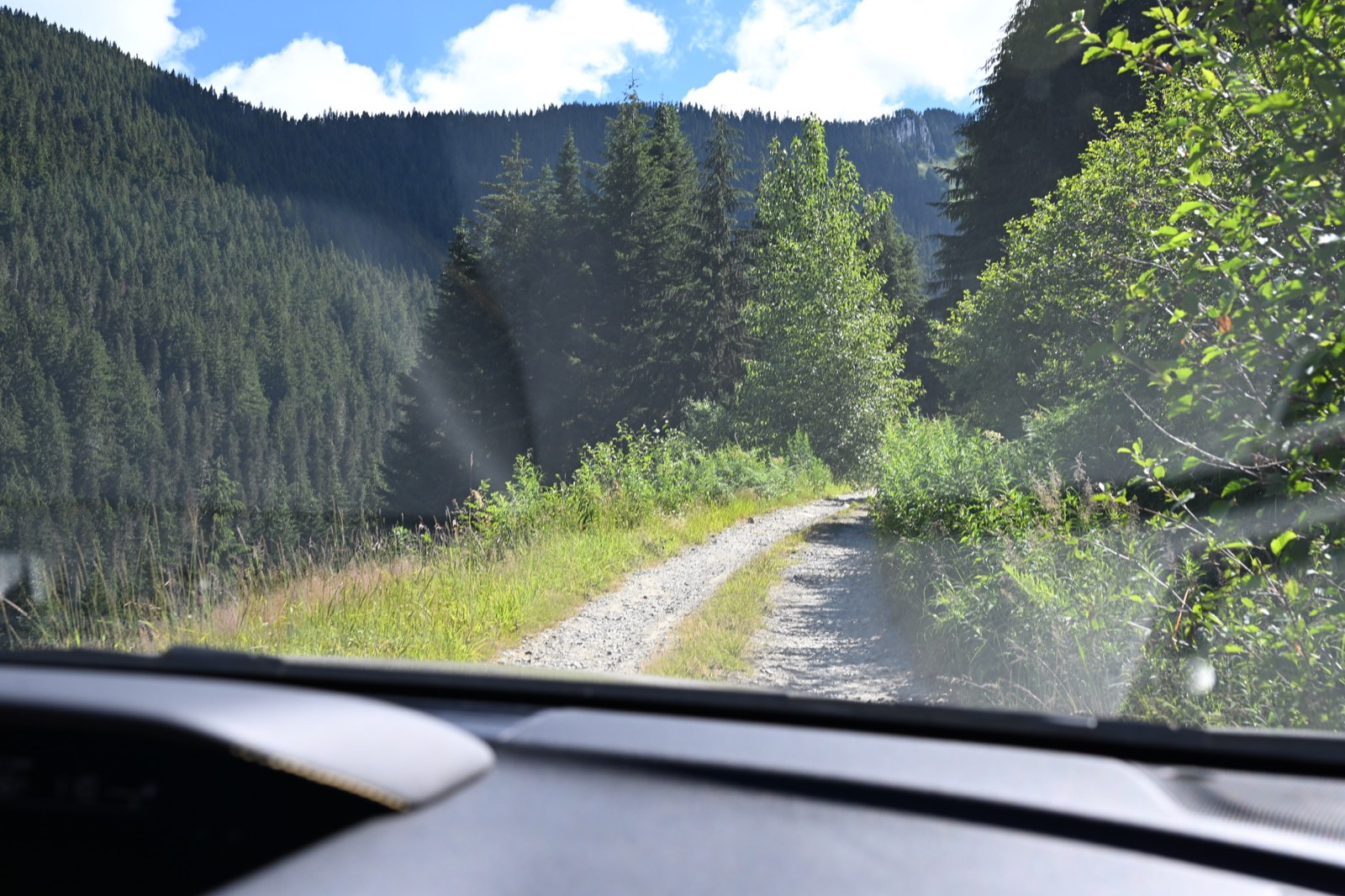 An open, wind-scoured stretch of trail high above the valley