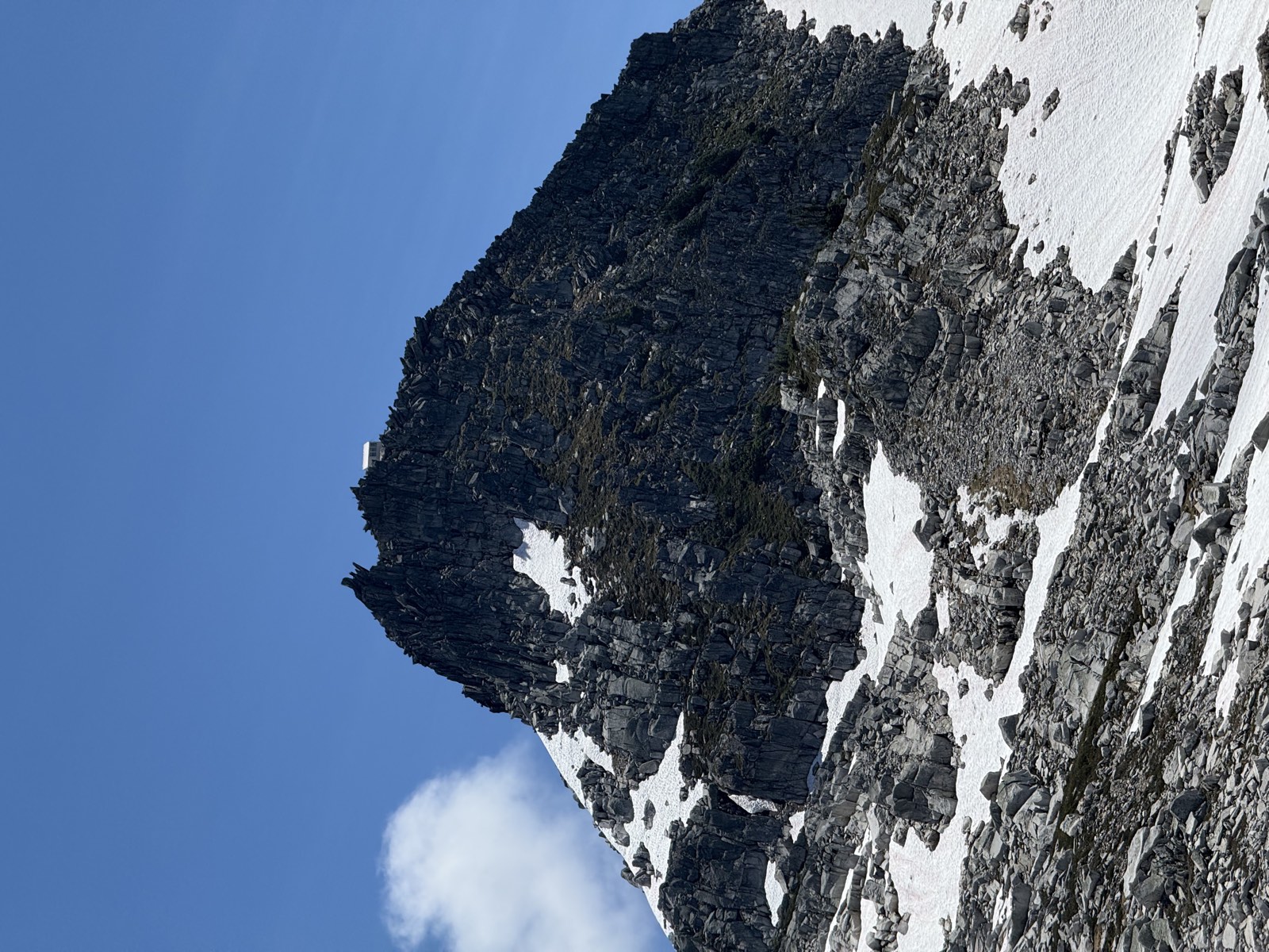 The lookout building perched on the rocky ridge ahead