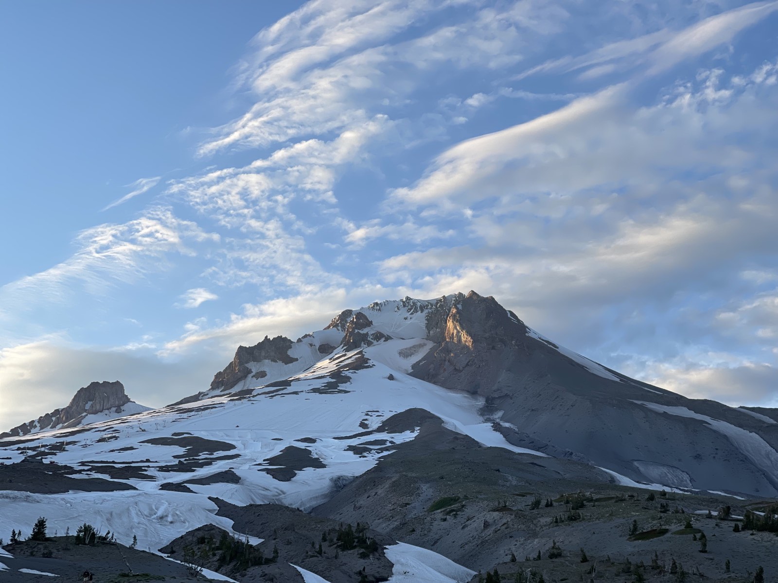 Alpenglow turning the snow on Mount Hood pink