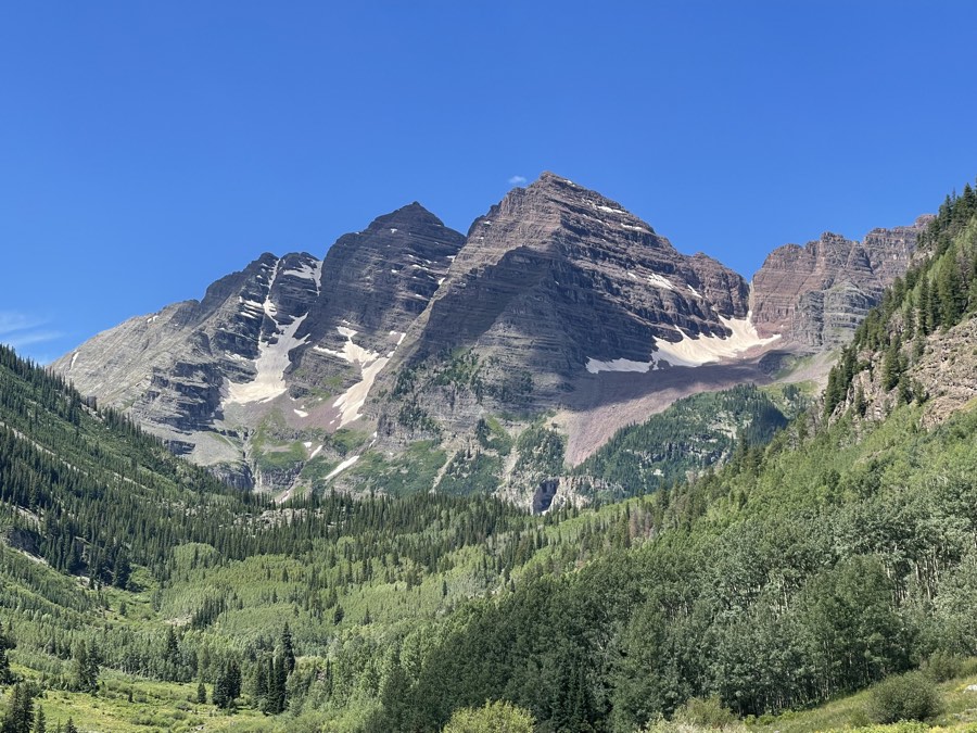 The bell-shaped Maroon Bells rising above the valley