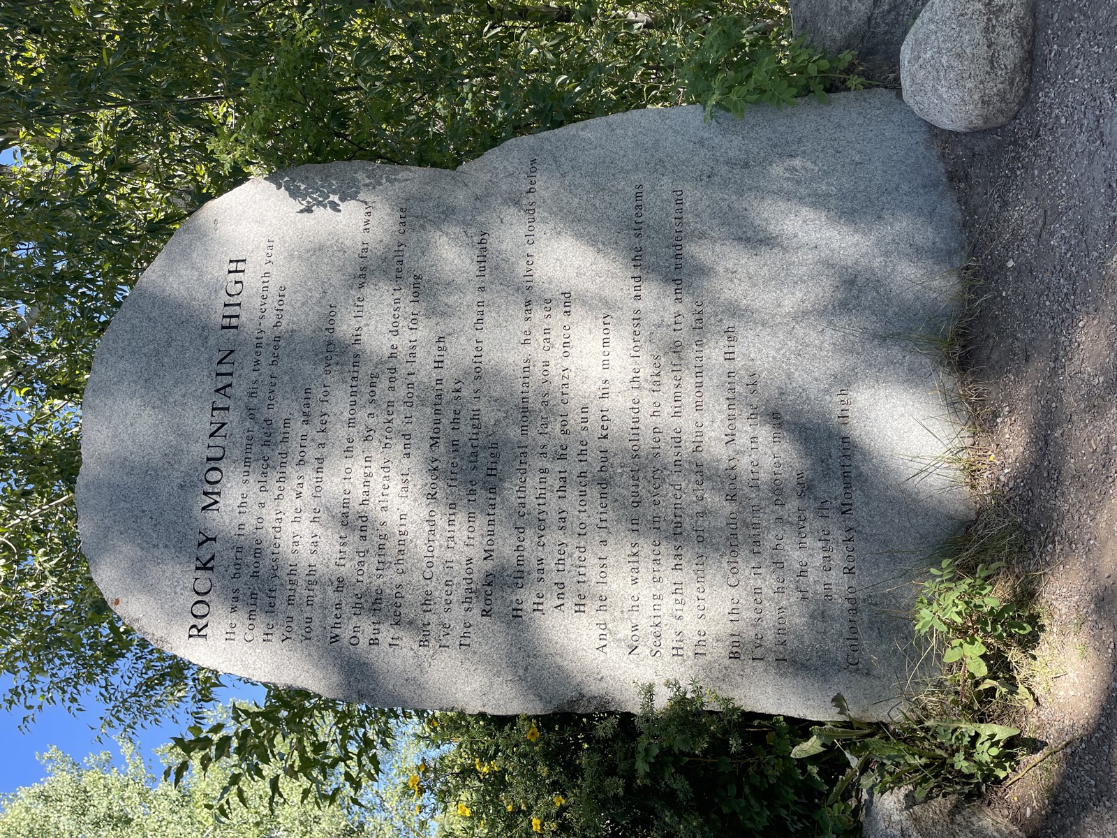 Song lyrics engraved into a large boulder