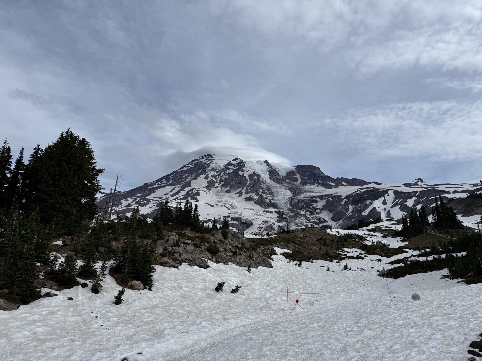 The glaciated mass of Mount Rainier rising above the Paradise area