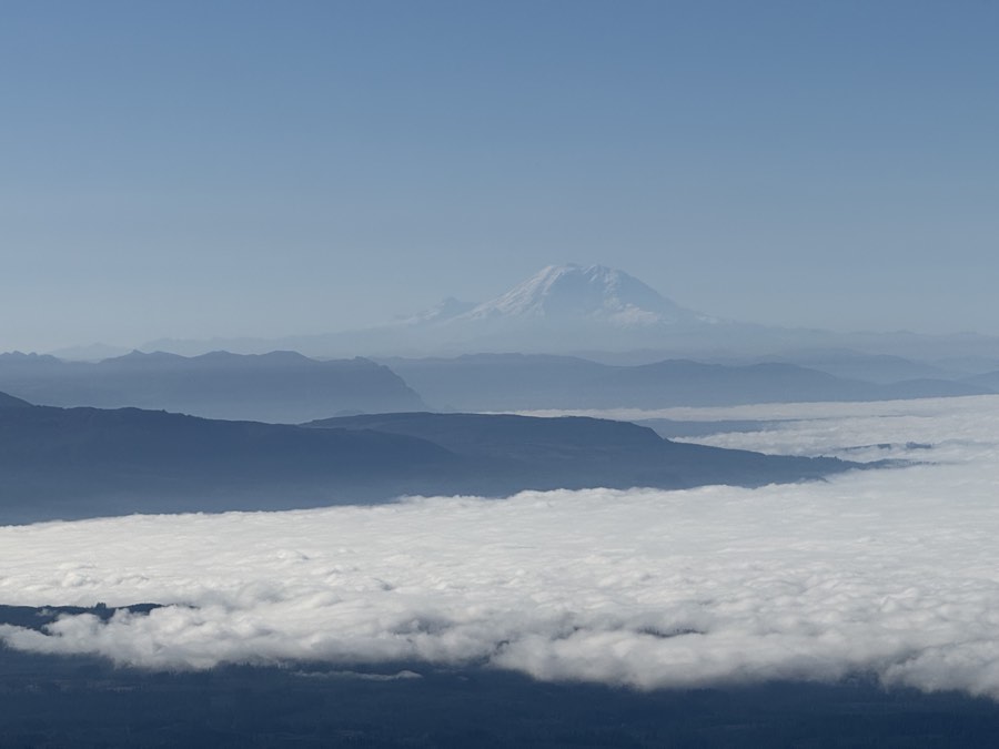 Mount Rainier rising above a sea of fog, seen from Mount Pilchuck