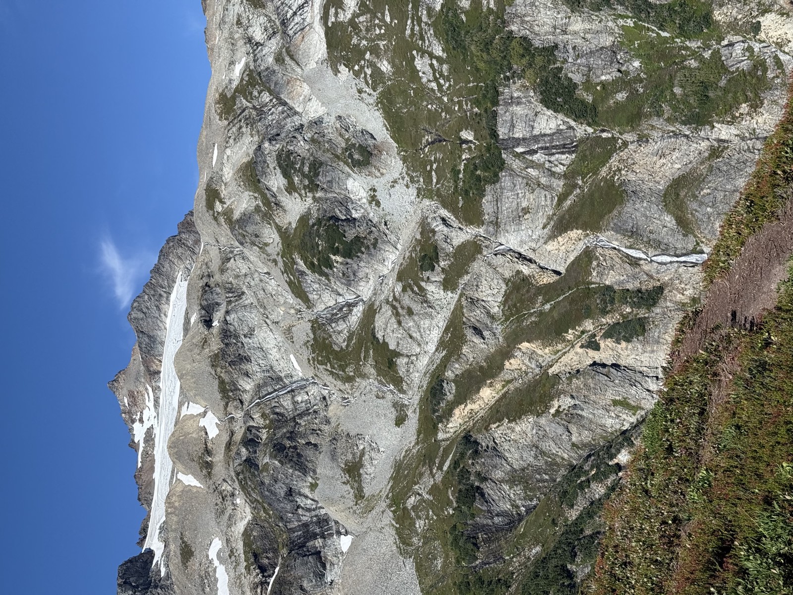 Meltwater falling from the glacier toward the lake below