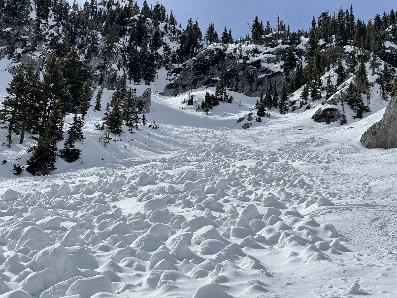 Chunks of snow left behind by a springtime slide