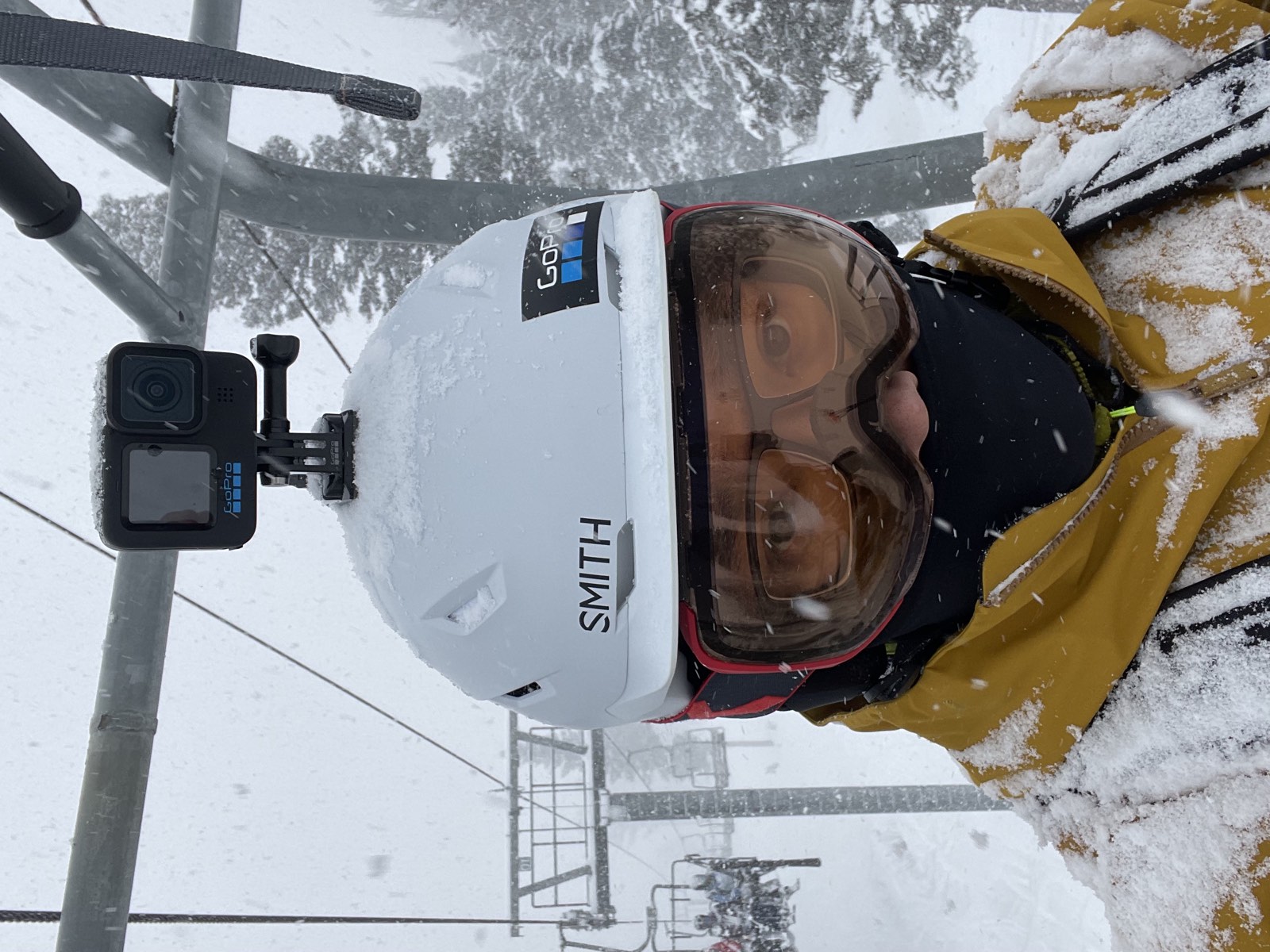 Selfie taken while skiing fresh snow