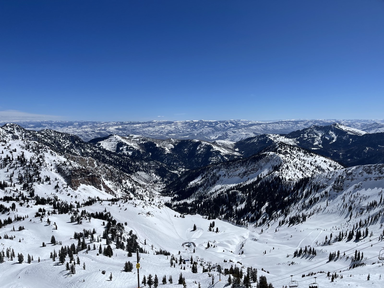 Snow-covered ridgelines stretching toward the horizon