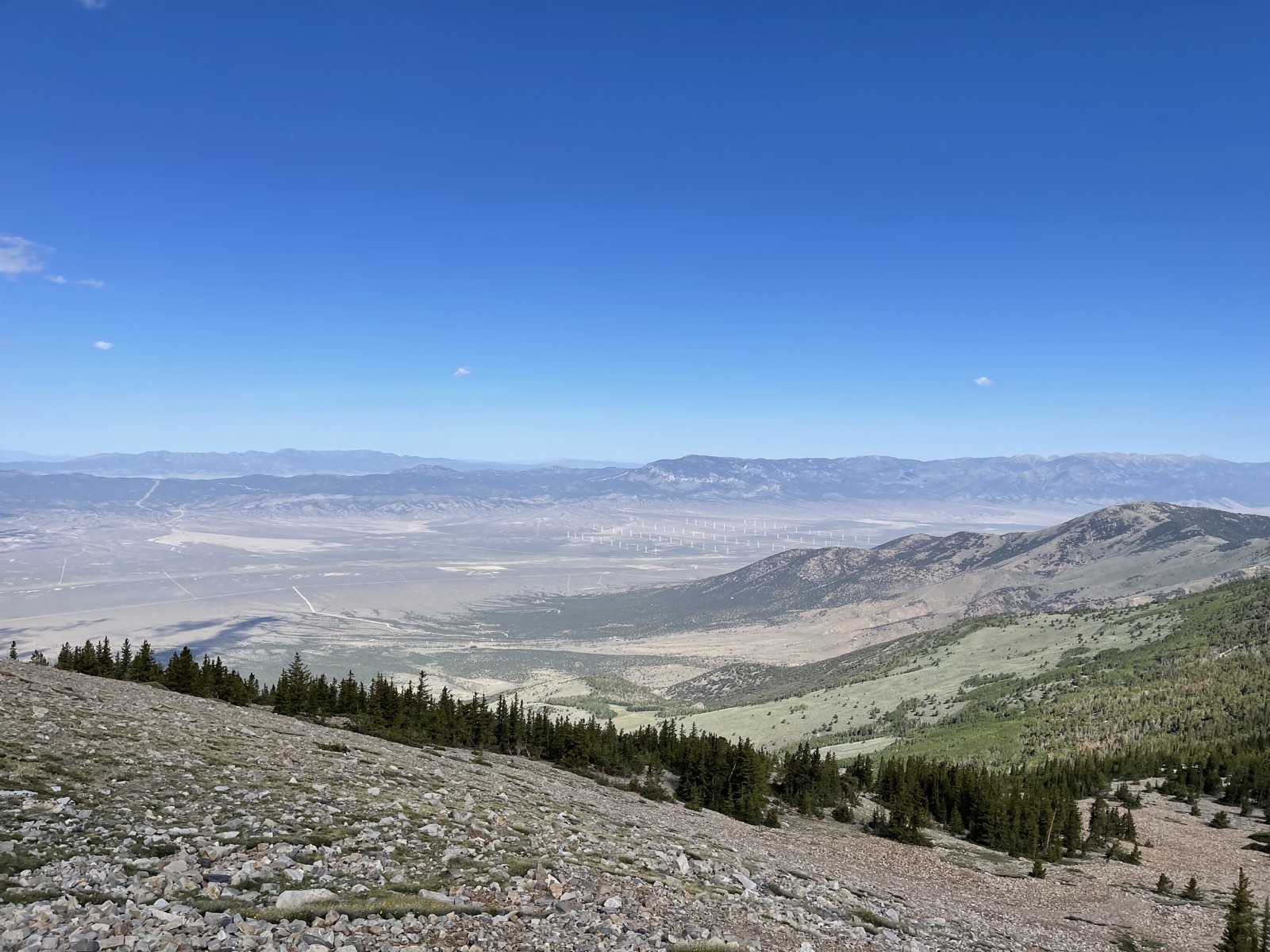 The dry basin stretching out far below the ridge